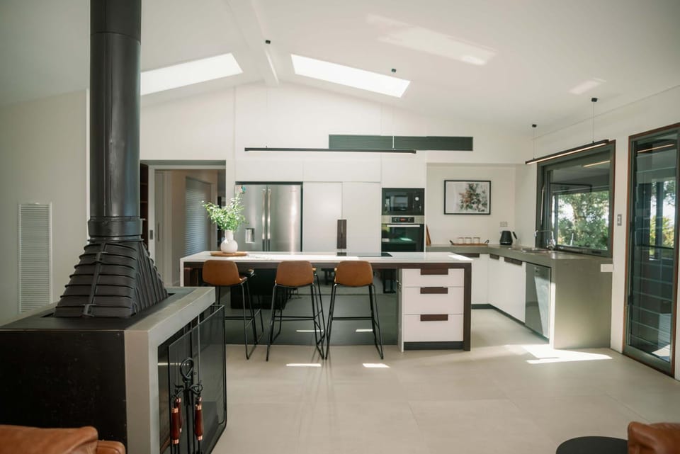 Kitchen or kitchenette, dishwasher, oven, stove