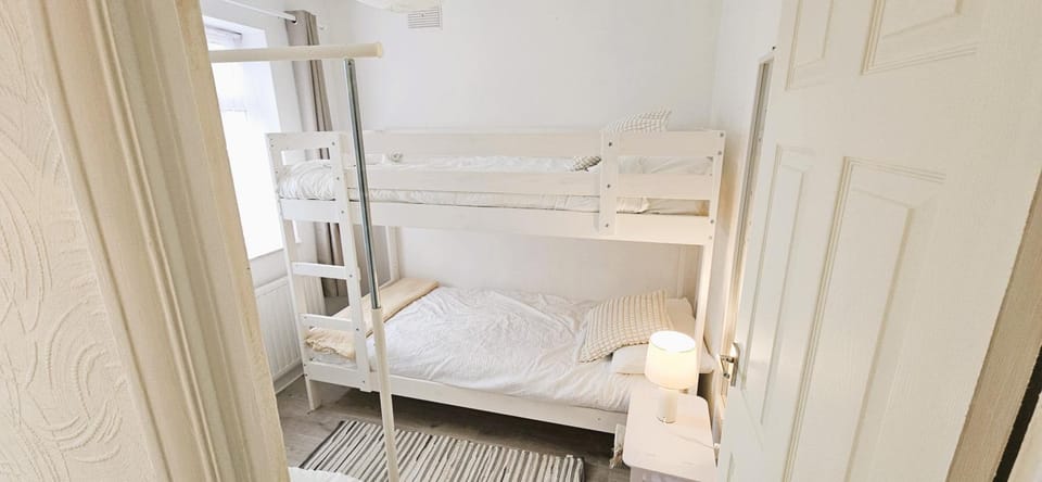 Bed, Photo of the whole room, Bedroom, bunk bed, towels, wardrobe