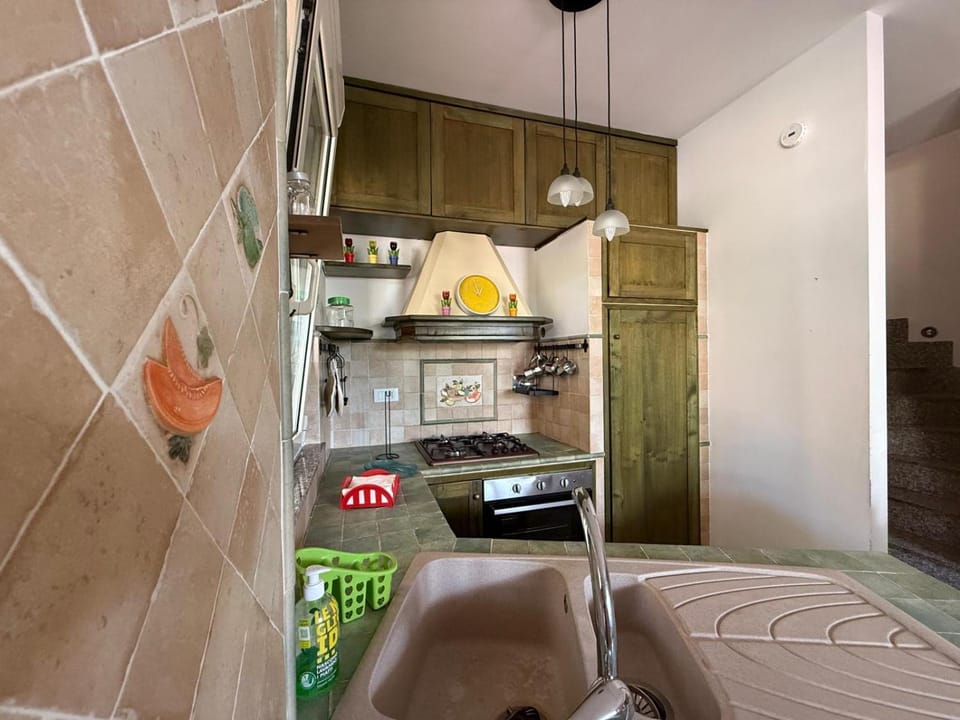 Kitchen or kitchenette, oven, stove
