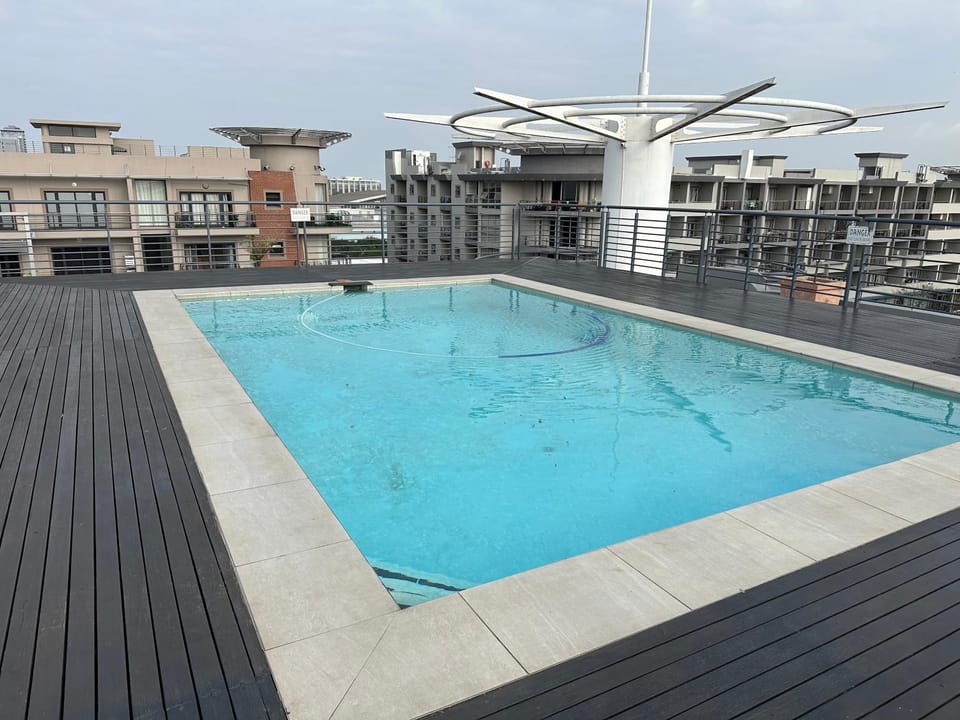 Swimming pool, sunbed