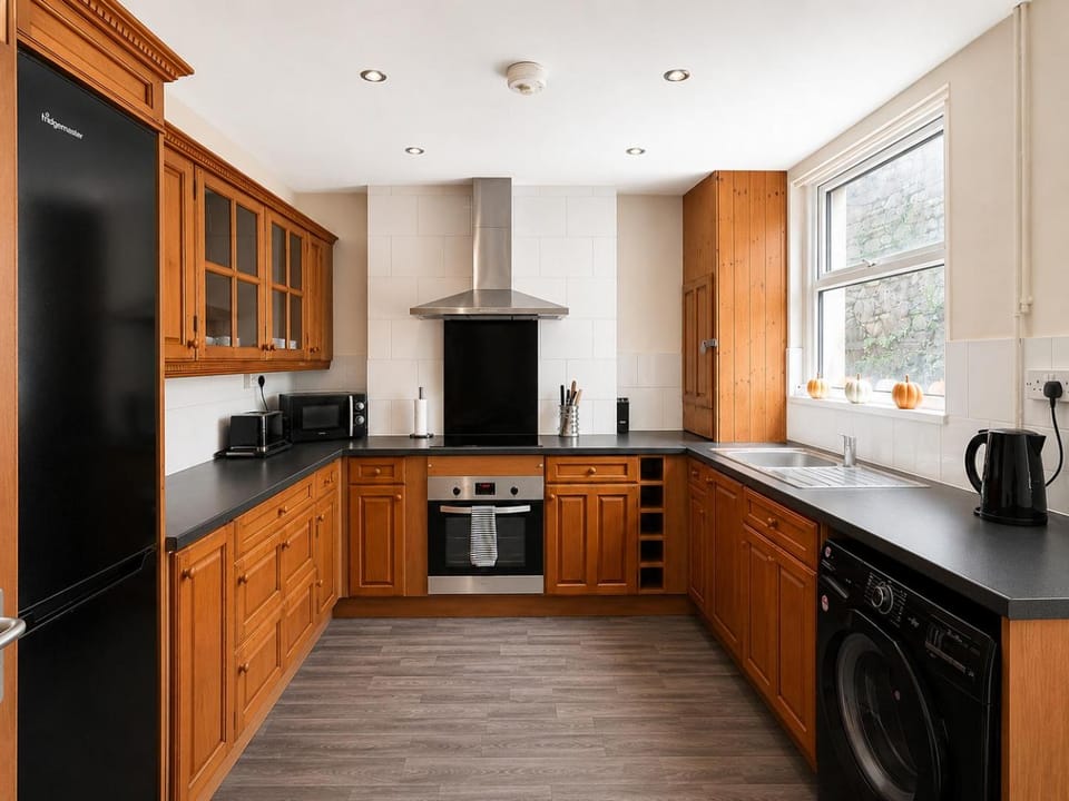 Kitchen or kitchenette, oven, stove