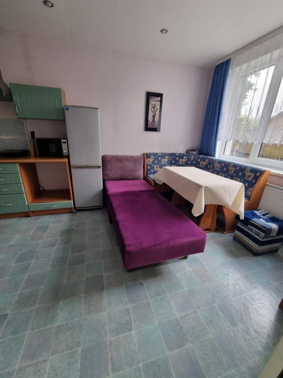 Bed, Dining area, stove, kitchen