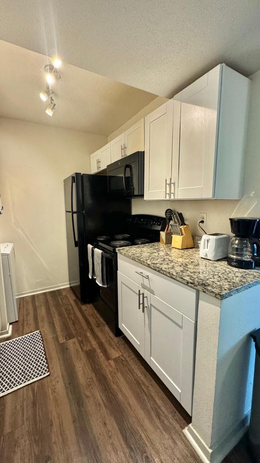 Kitchen or kitchenette, oven, stove, toaster