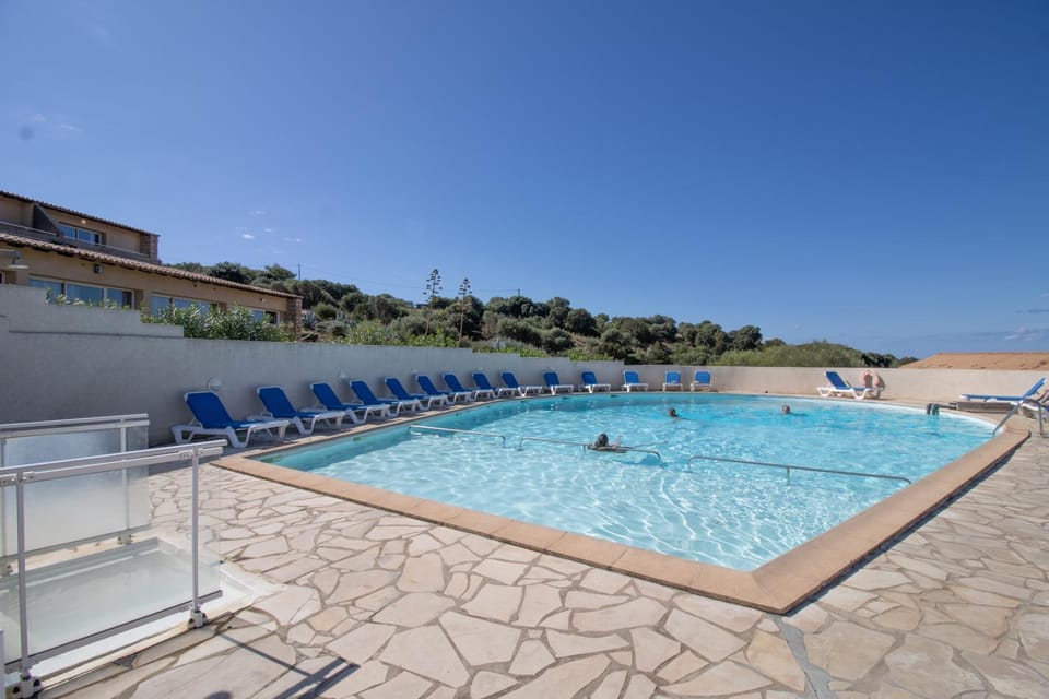 Property building, Living room, Swimming pool