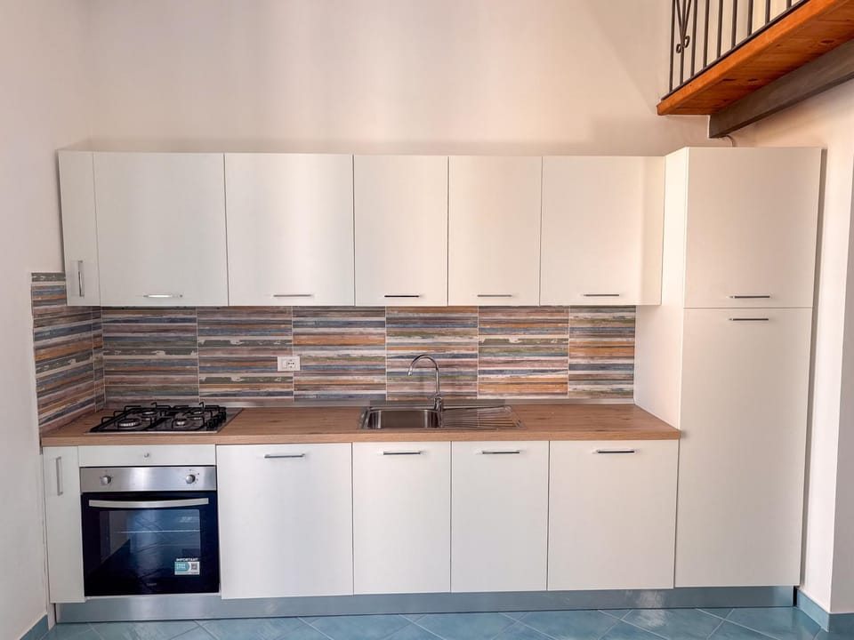 Kitchen or kitchenette, oven