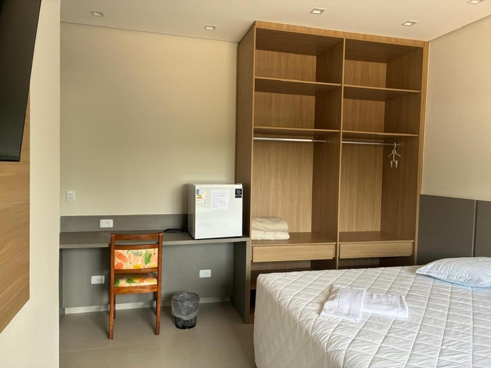 Bed, minibar, wardrobe