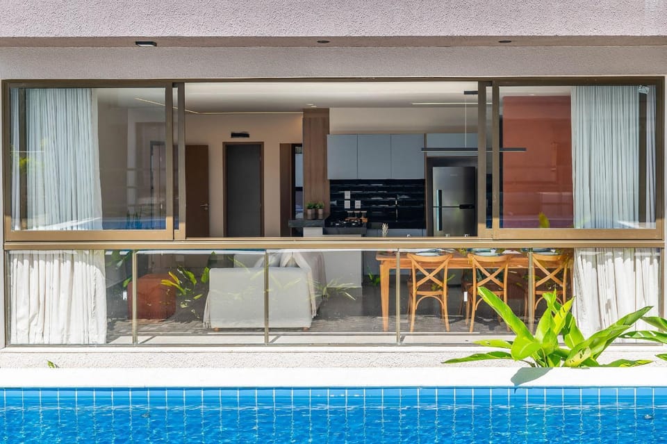 Patio, Day, View (from property/room), Balcony/Terrace, Living room, Seating area, Pool view, Swimming pool