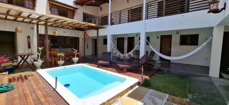 Property building, Patio, Day, Garden, View (from property/room), Garden view, Pool view, Swimming pool, Swimming pool, sunbed