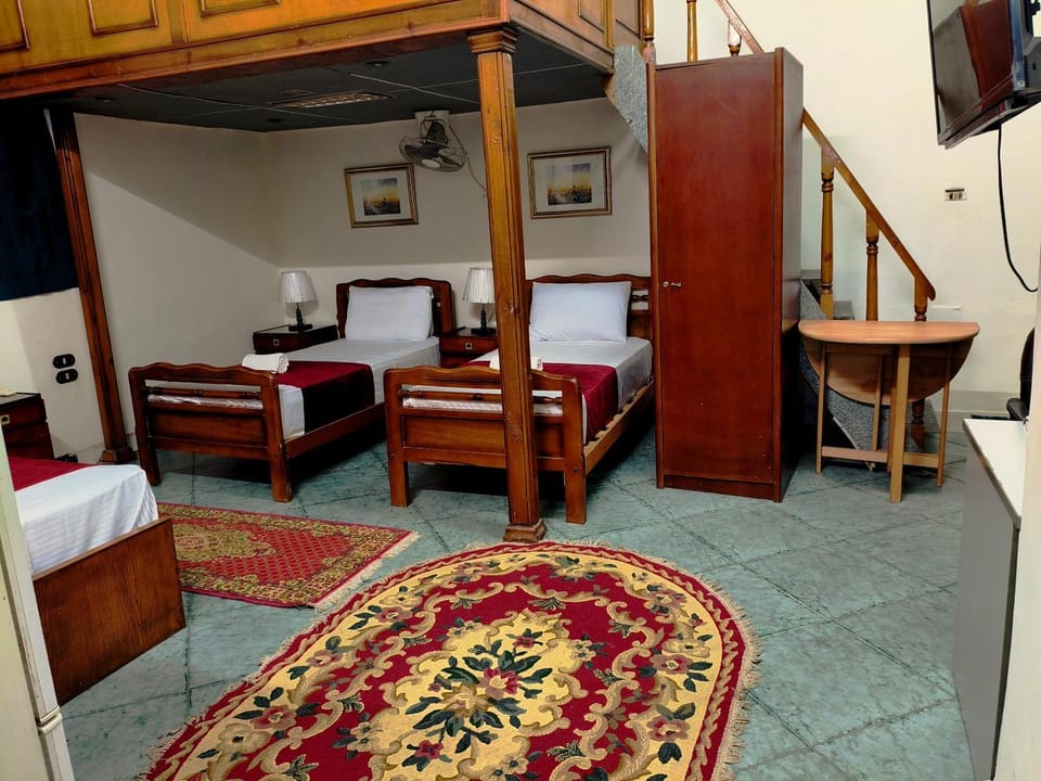 Bed, Decorative detail, Bedroom, Family, towels, wardrobe