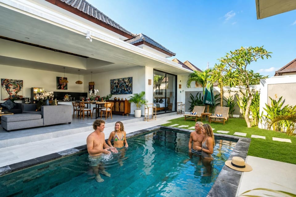 Property building, Living room, Swimming pool, group of guests, sunbed, towels