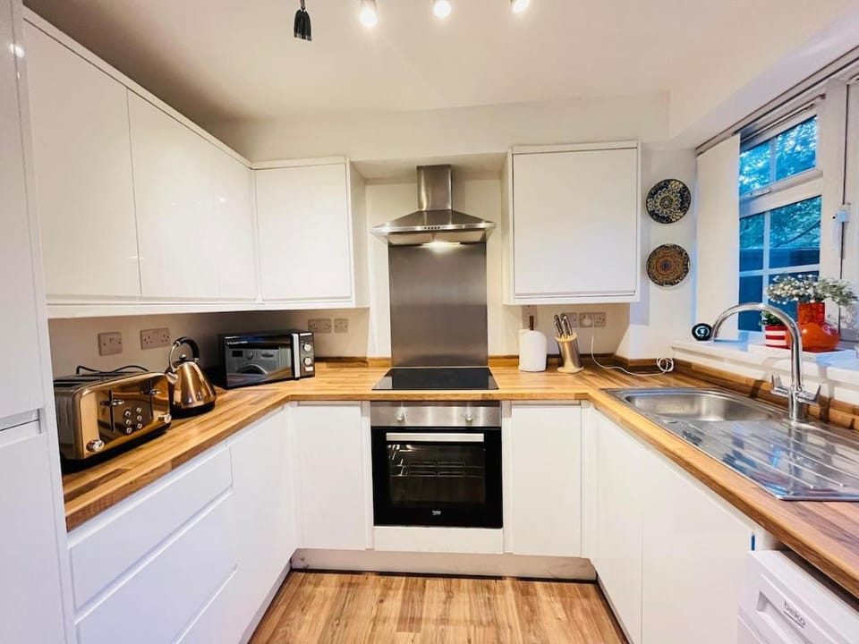 Kitchen or kitchenette, oven, stove, toaster