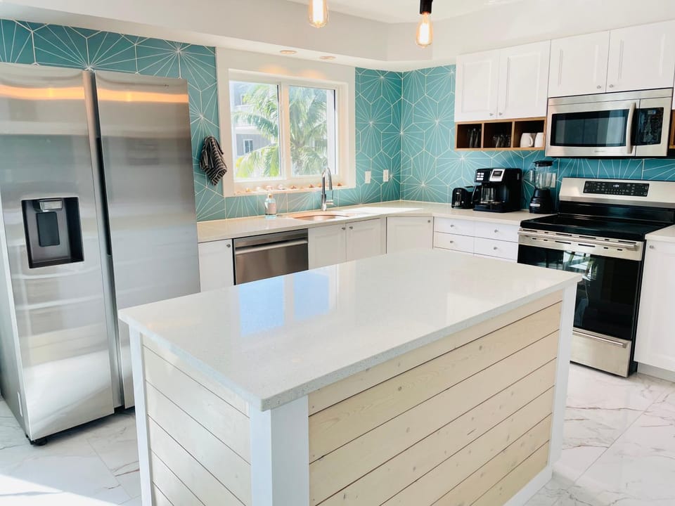Kitchen or kitchenette, dishwasher, oven, stove, toaster