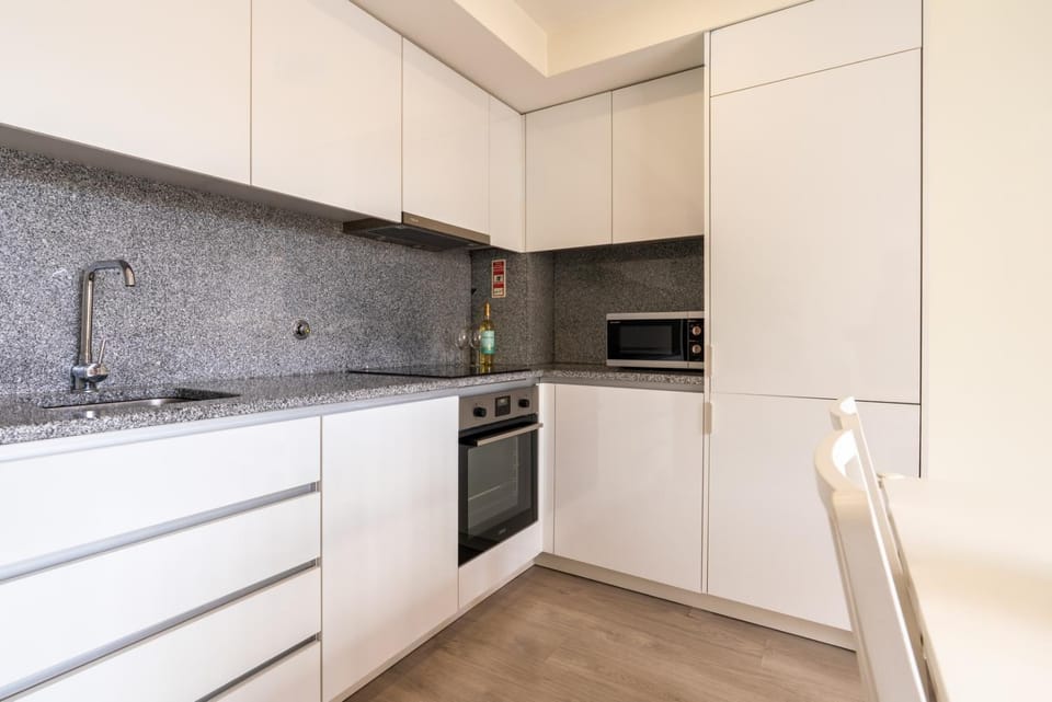 Kitchen or kitchenette, oven, stove