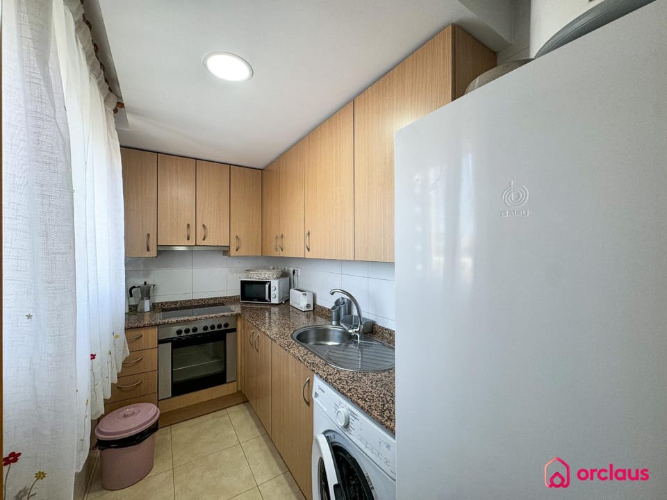 Kitchen or kitchenette, oven, stove, toaster