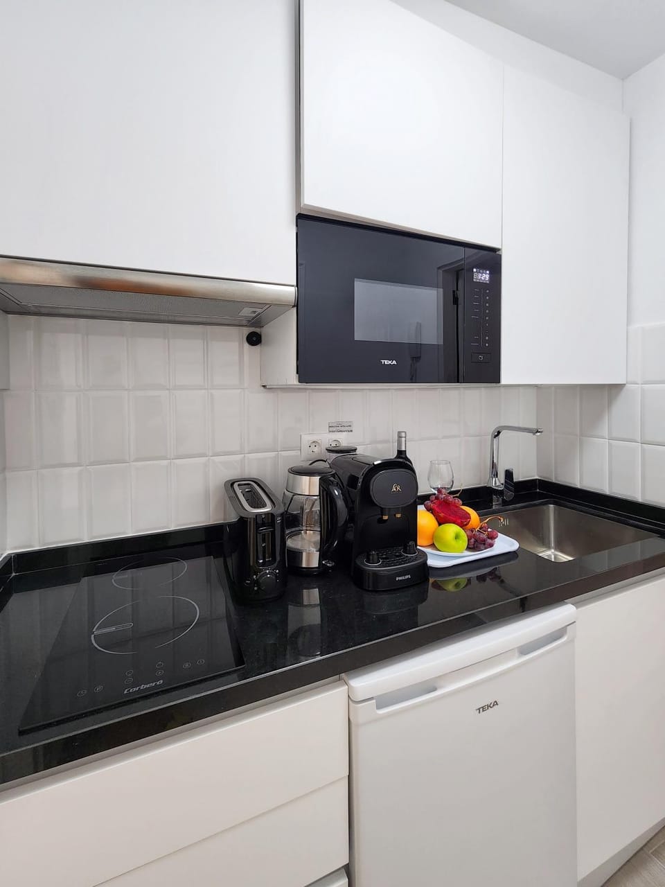 Kitchen or kitchenette, stove, toaster