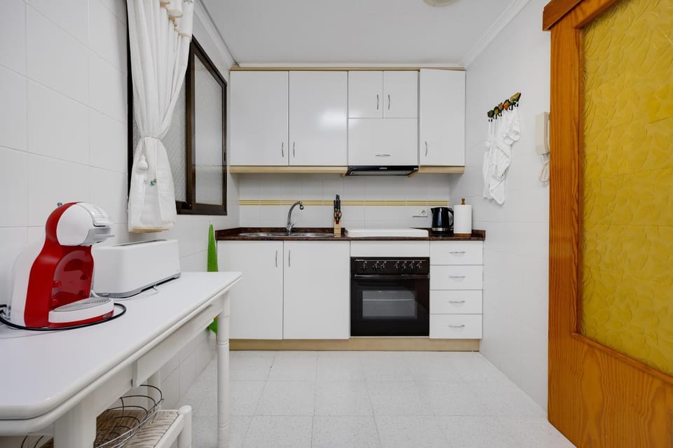 Kitchen or kitchenette, oven, stove
