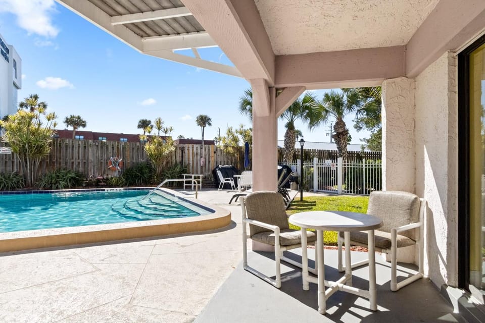 Property building, Patio, Day, Natural landscape, BBQ facilities, View (from property/room), Balcony/Terrace, Balcony/Terrace, Other, Seating area, Pool view, Swimming pool, sunbed