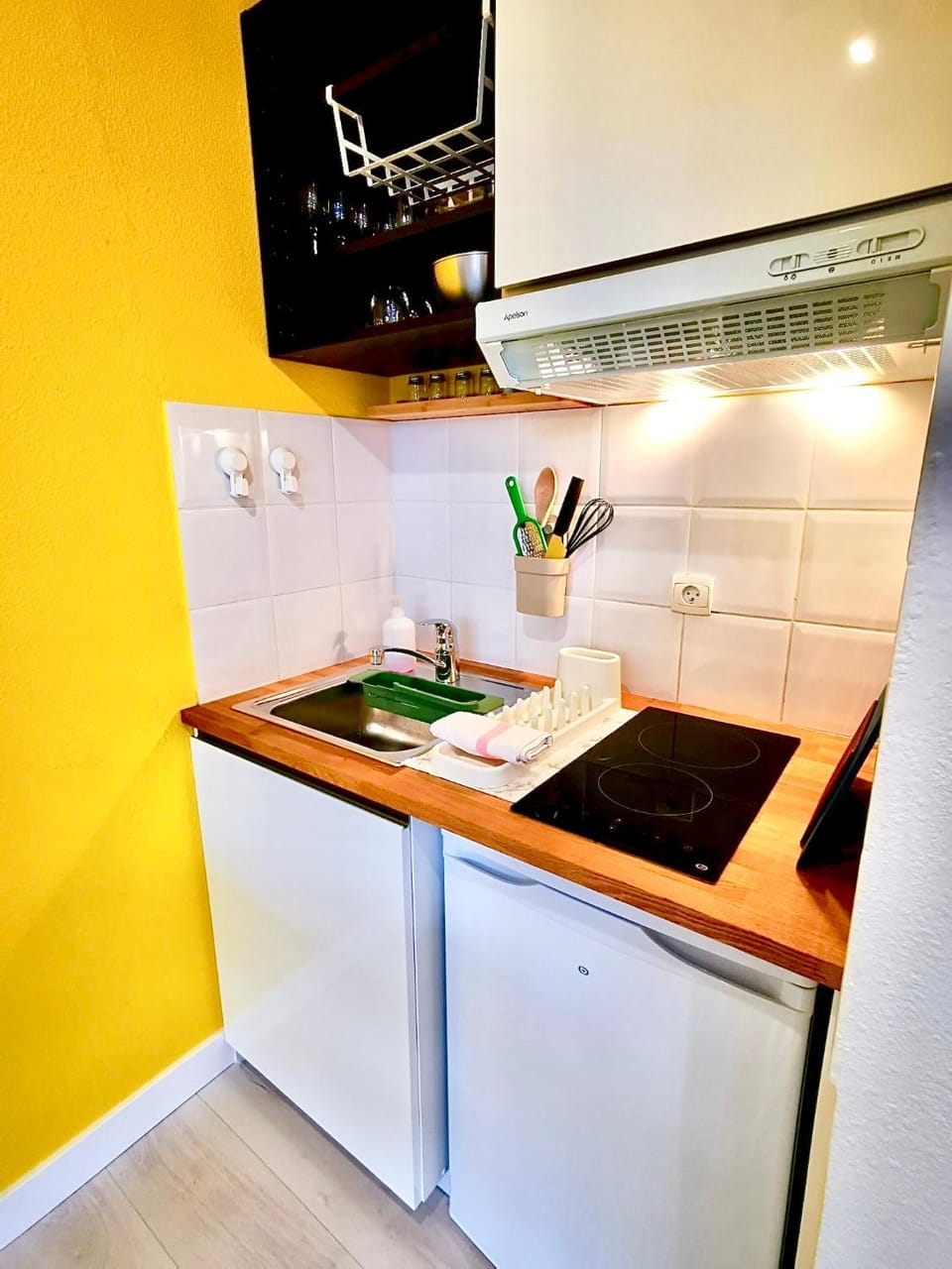 Kitchen or kitchenette, storage, stove