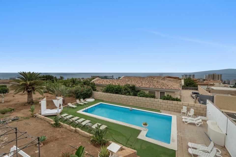 Property building, Living room, Swimming pool