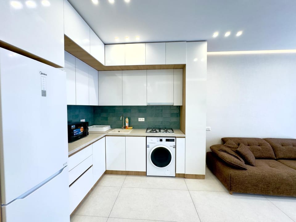 Kitchen or kitchenette, Living room, Seating area, washing machine