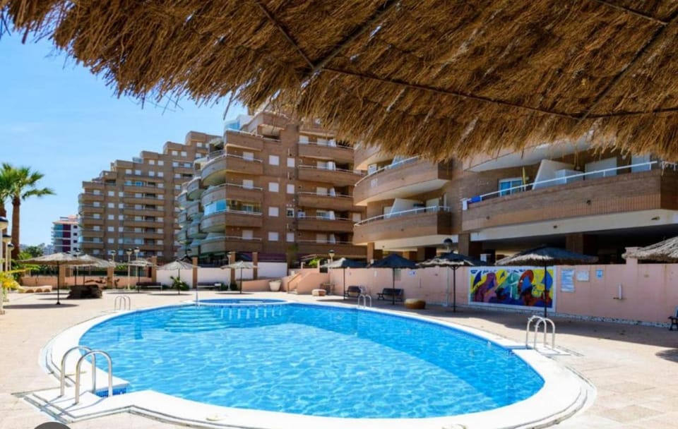 Property building, Patio, Day, Pool view, Swimming pool