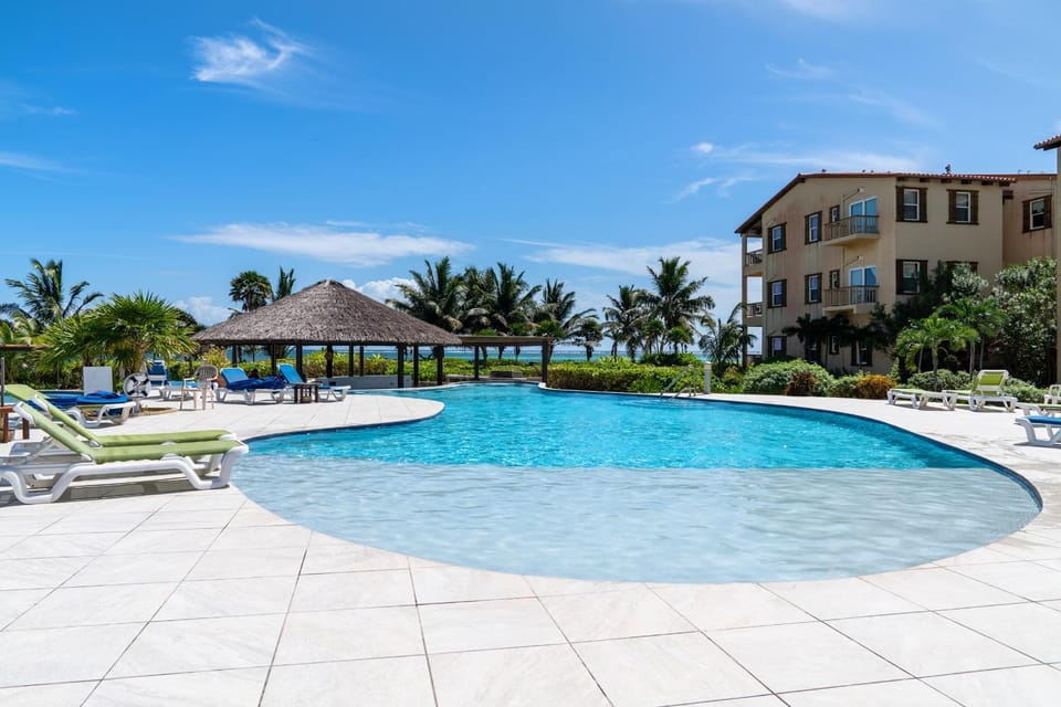 Residences at Barrier Reef 1-3B Oceanfront 2 BR by Stay Floreo House in Corozal District