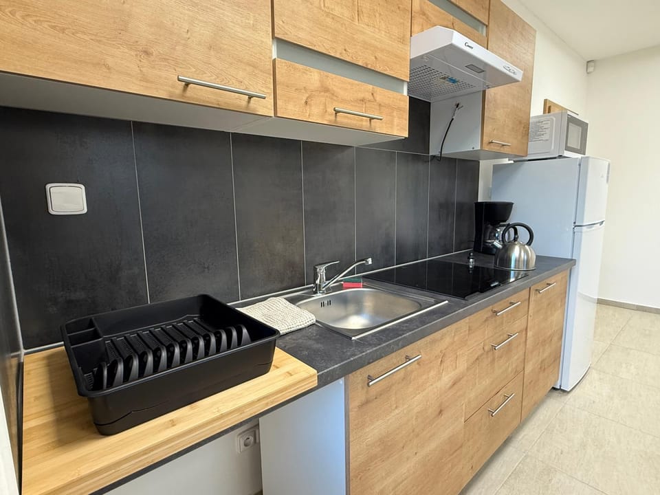 Kitchen or kitchenette, stove