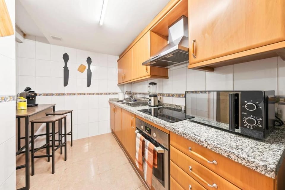 Kitchen or kitchenette, oven, stove, toaster