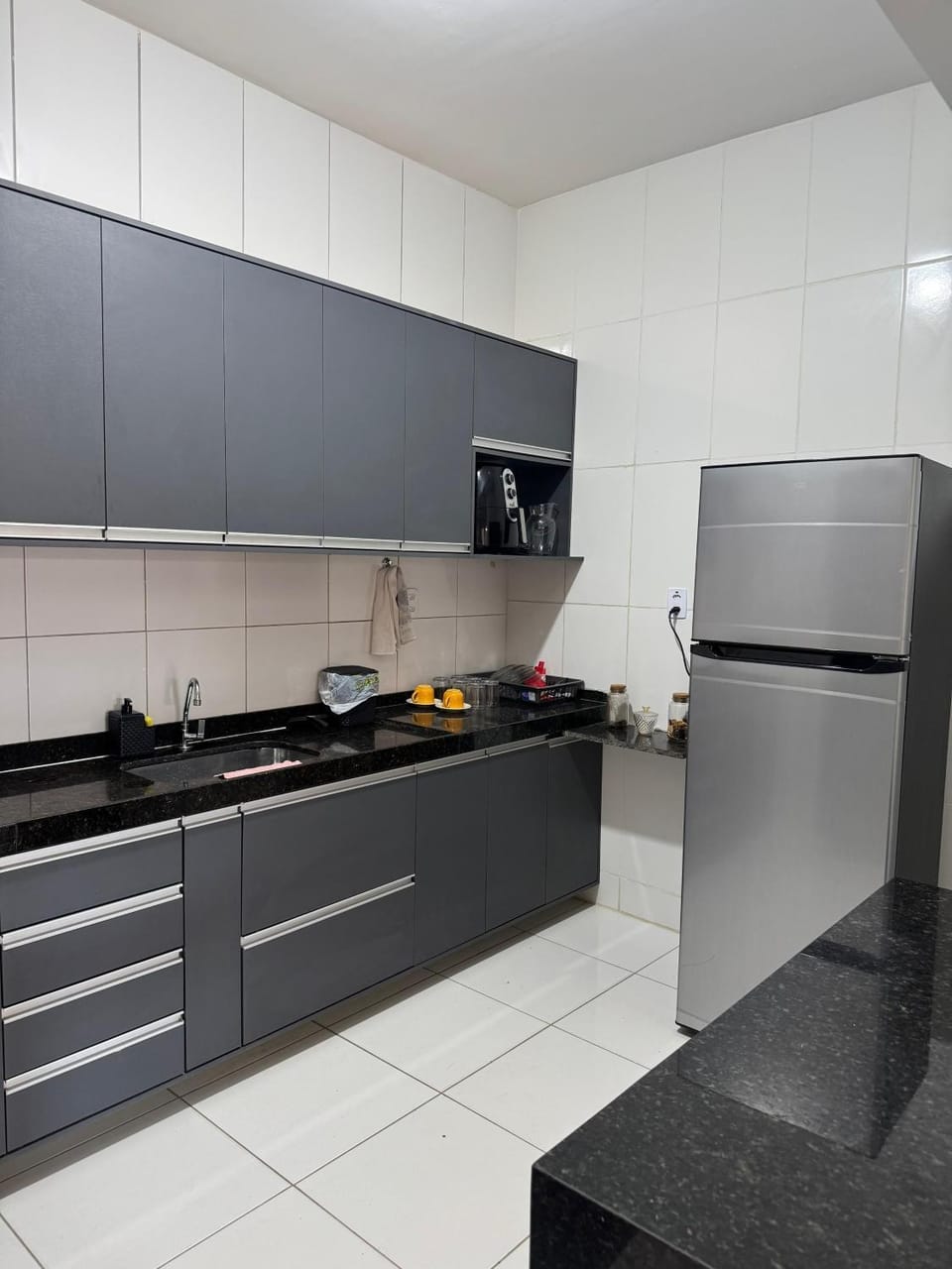 Kitchen or kitchenette, dishwasher, oven, stove, toaster