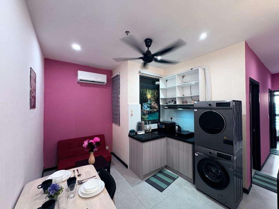 Kitchen or kitchenette, Dining area, stove, washing machine, dryer, air conditioner