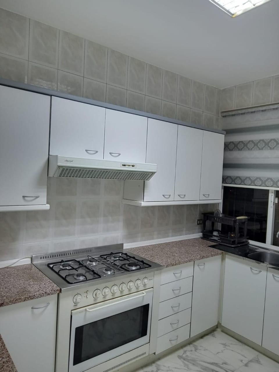 Kitchen or kitchenette, stove