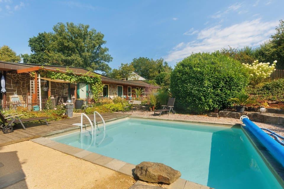 Property building, Living room, Swimming pool