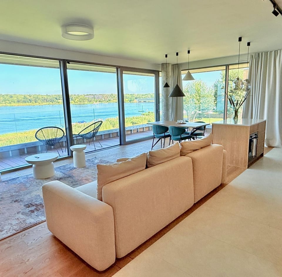 Natural landscape, Living room, Seating area, Dining area, Lake view, River view