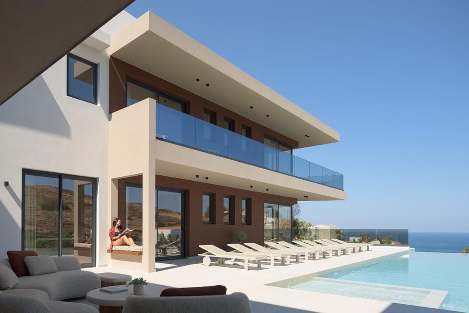 Property building, View (from property/room), Seating area, Sea view, Swimming pool