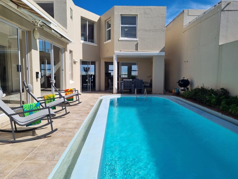 Property building, BBQ facilities, Dining area, Swimming pool, sunbed