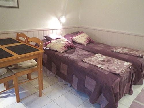 Bed, Living room, Seating area, Bedroom