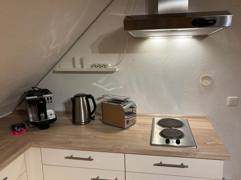 Kitchen or kitchenette, stove