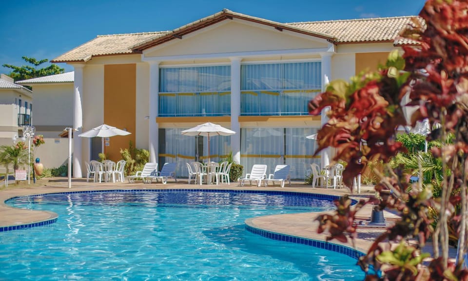 Property building, Day, Pool view, Swimming pool, sunbed
