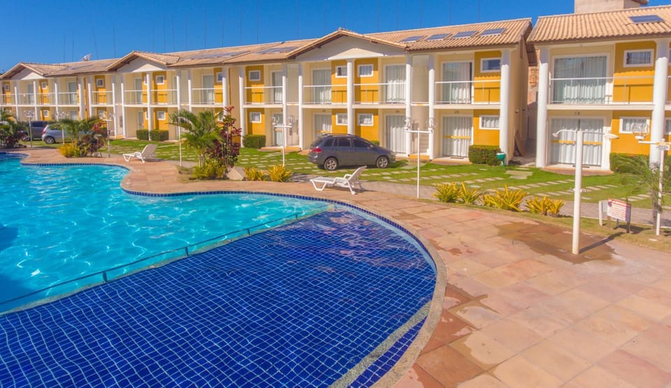 Property building, Day, Pool view, Swimming pool, sunbed