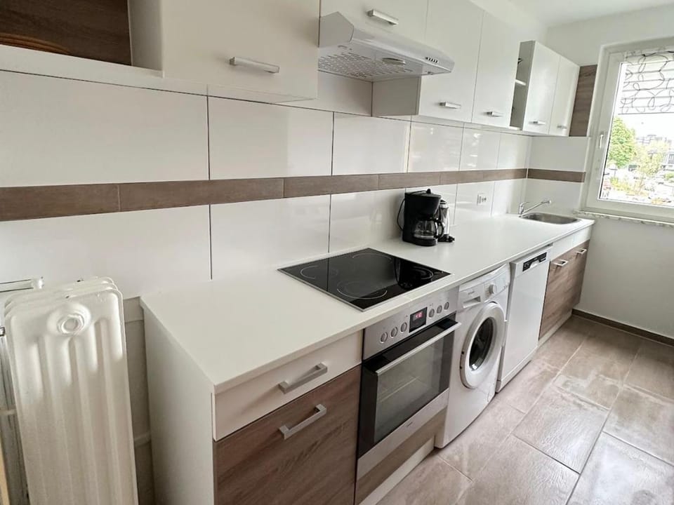 Kitchen or kitchenette, dishwasher, oven, stove, washing machine, dryer