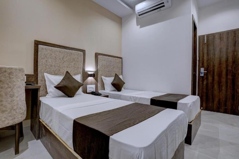 Hotel Arvind- Glitz Hospitality Thane Railway Station Hotel in Thane