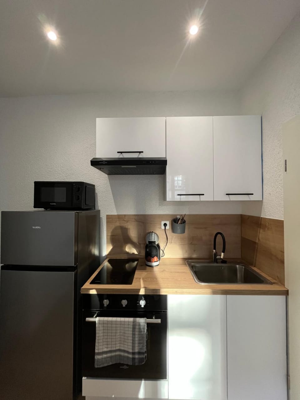 Kitchen or kitchenette, oven, stove, toaster