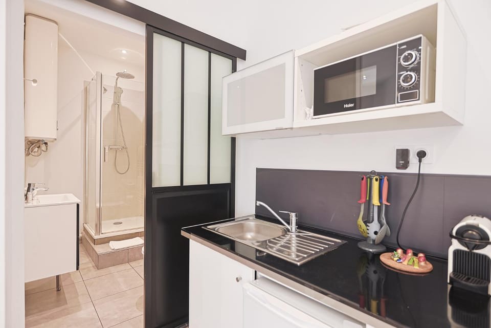 Toilet, Bathroom, Kitchen or kitchenette, microwave, stove