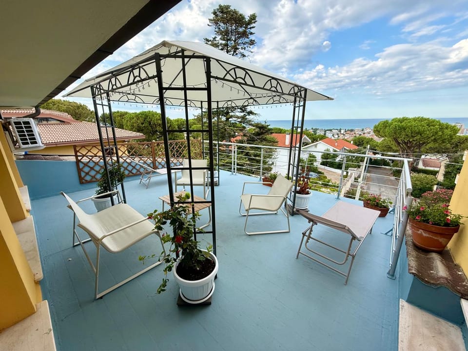 Property building, Day, Natural landscape, View (from property/room), Balcony/Terrace, Seating area, Sea view