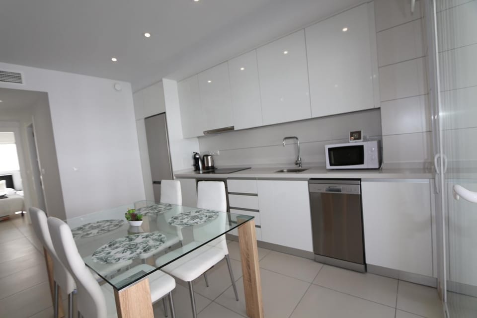 Kitchen or kitchenette, microwave, oven, stove, kitchen
