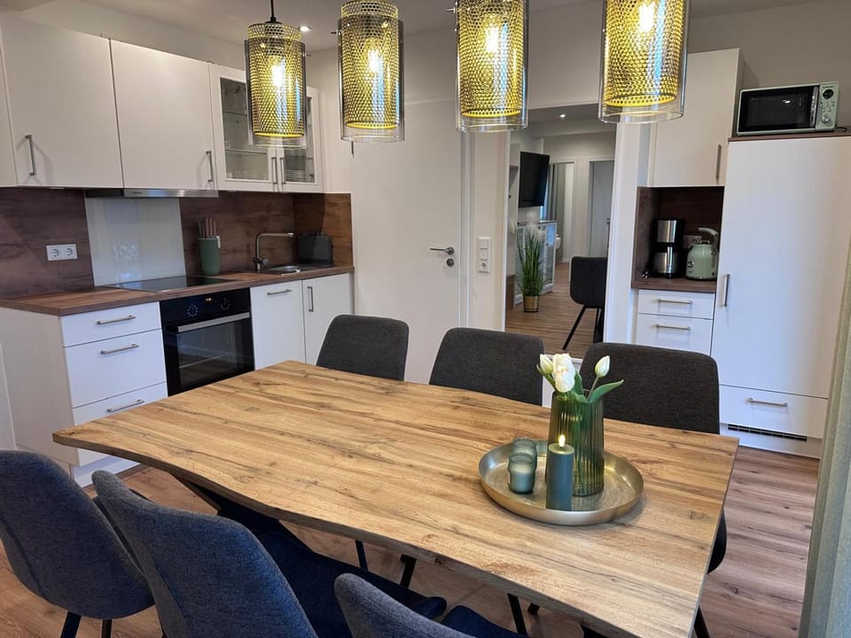 Kitchen or kitchenette, Seating area, Dining area, dishwasher, microwave, oven, stove, toaster, kitchen, kitchen