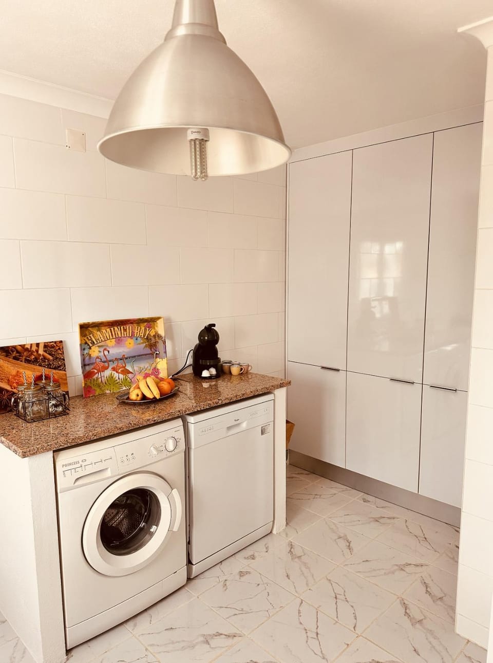 Kitchen or kitchenette, washing machine, dryer