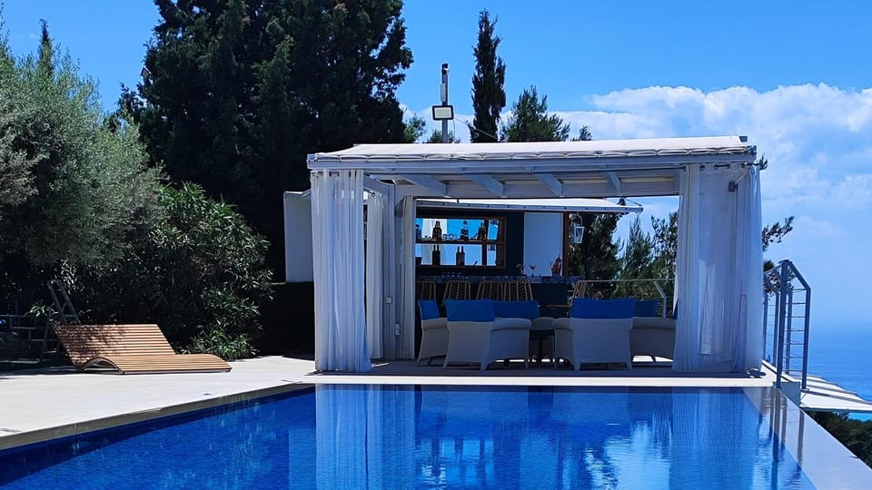 Lounge or bar, Seating area, Pool view, Sea view, Swimming pool