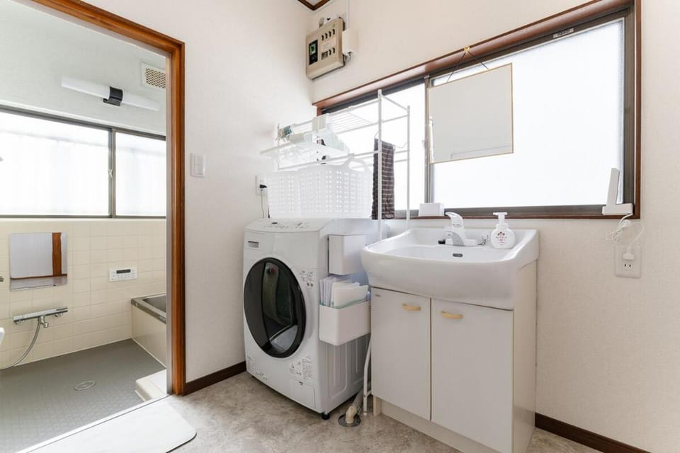 Bathroom, towels, washing machine, dryer