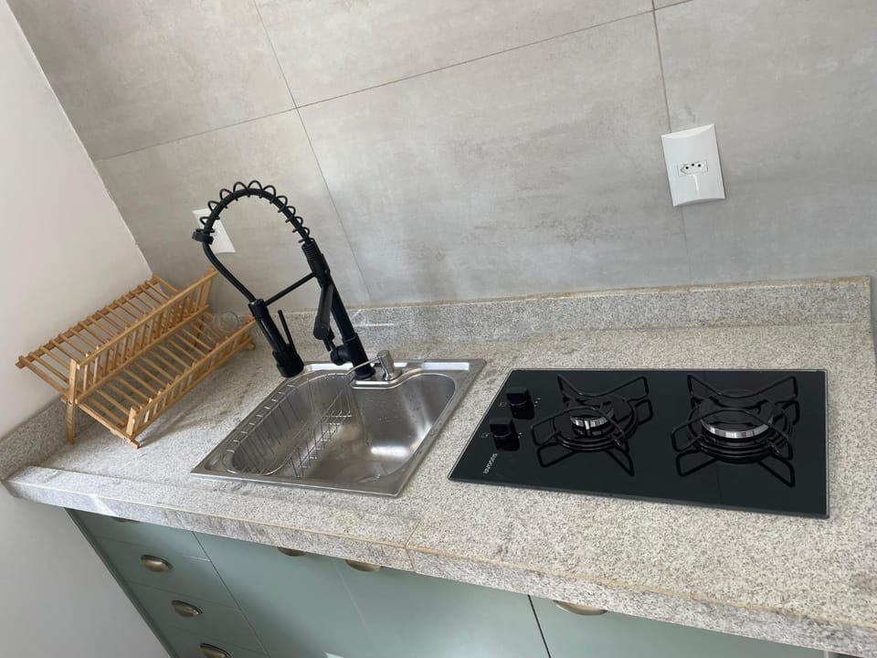 Kitchen or kitchenette, microwave, stove